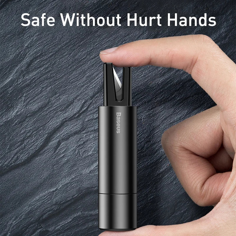 Hand holding a black electronic device with 'Baseus' branding against a dark textured background.