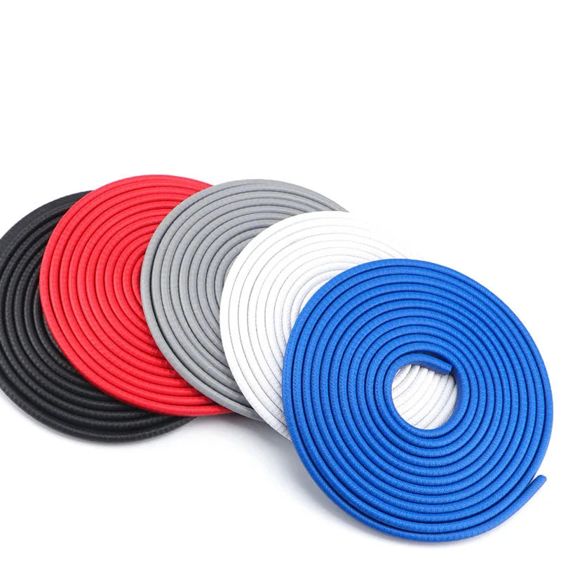 Set of colorful flat cables in black, red, gray, white, and blue on a white background