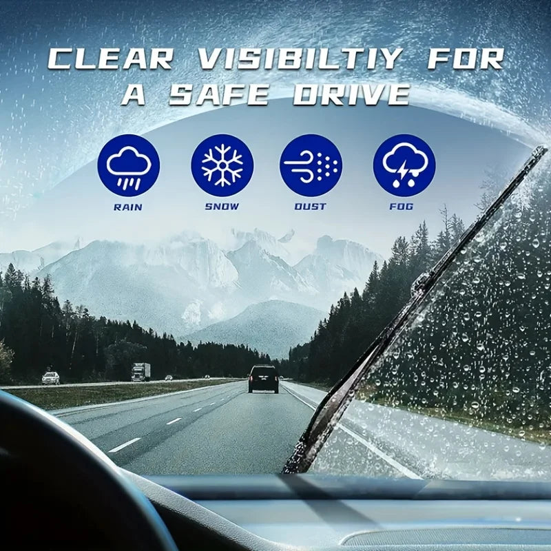 Car windshield with wiper, mountain road, and text 'Clear Visibility for a Safe Drive' on a clear sky background.