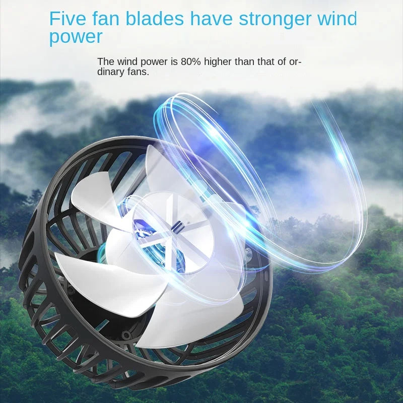 Handheld fan with text about stronger wind power against a scenic background