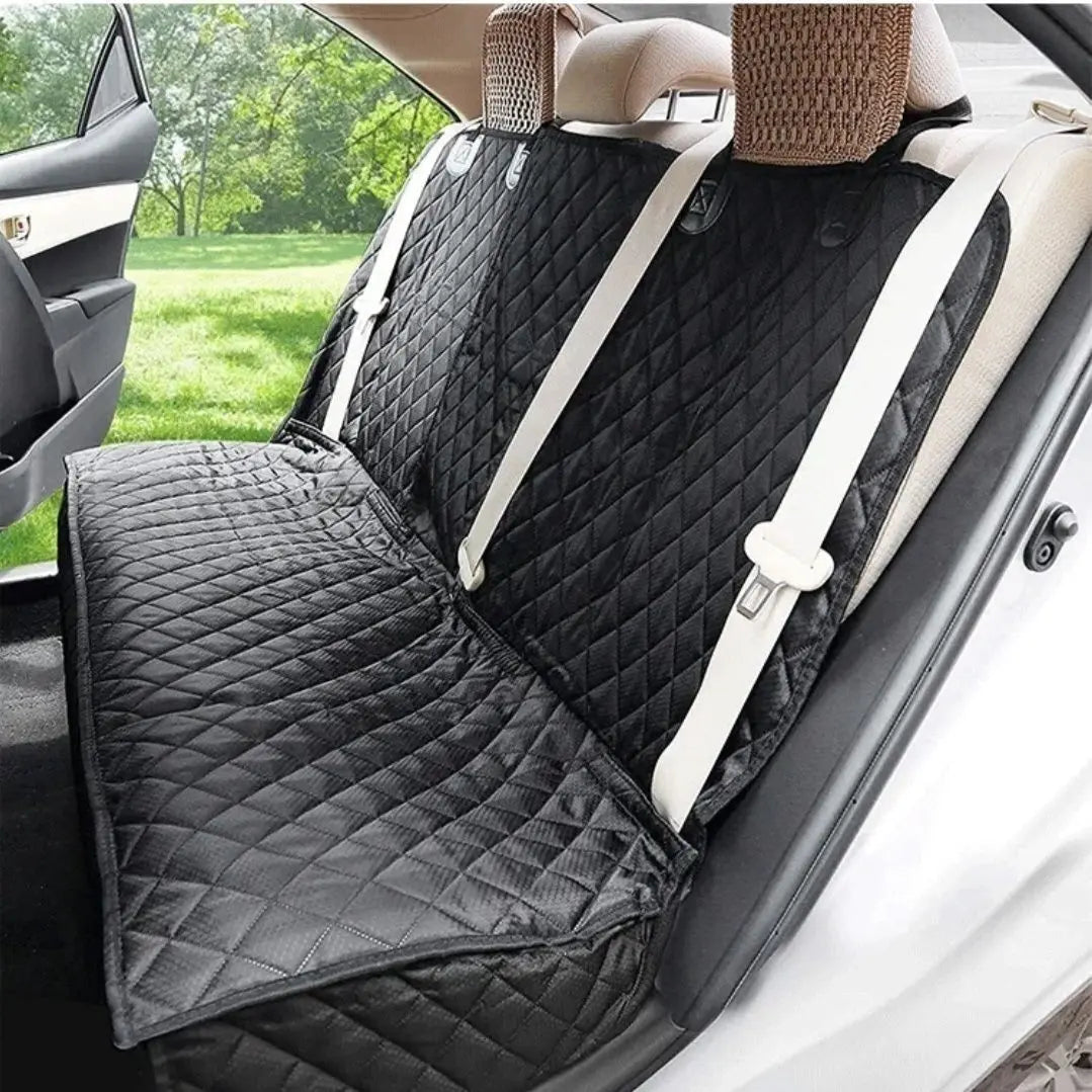 Black quilted car seat cover with a pattern on a car seat