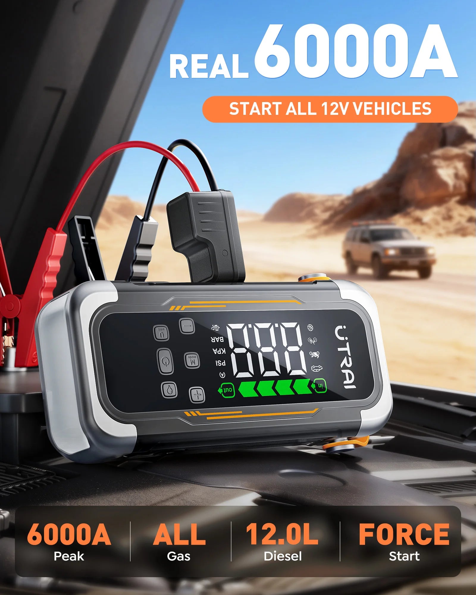 Jump starter with digital display on a vehicle dashboard, with a desert landscape in the background.
