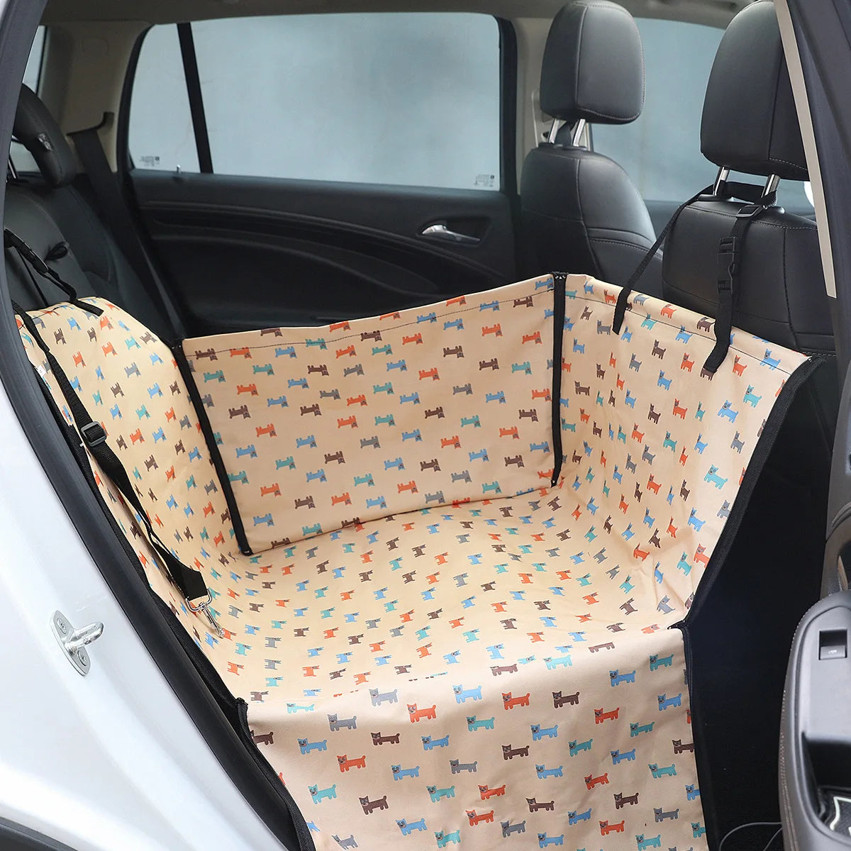 Pet seat cover with dog pattern in a car