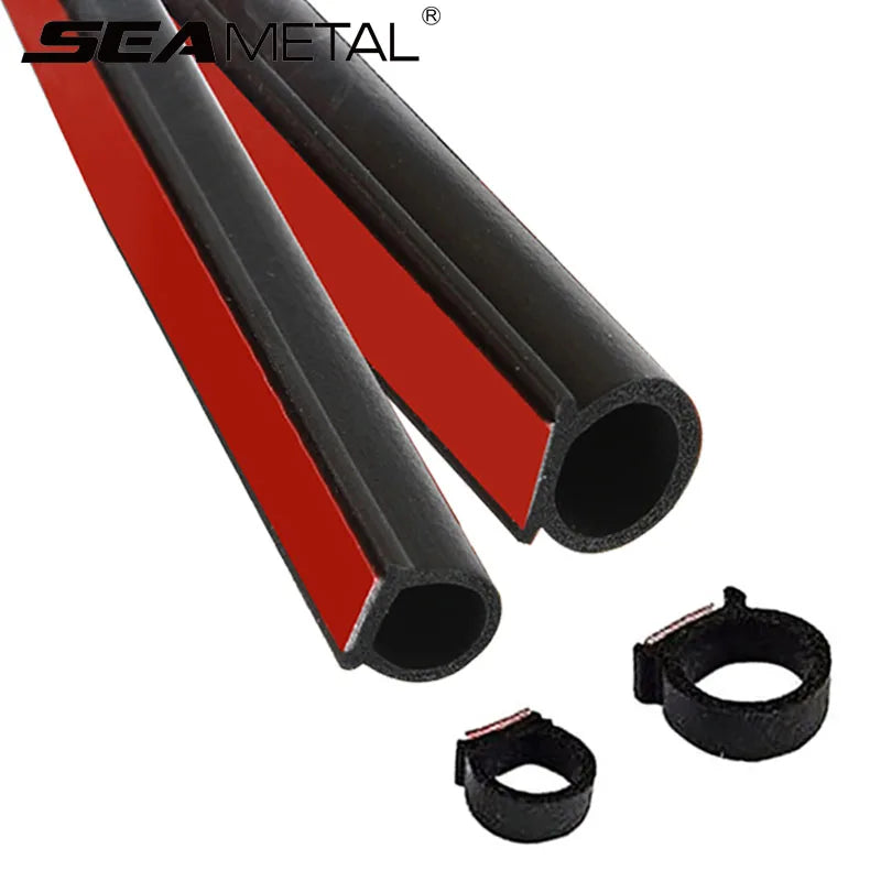 Two black and red metal pipes with clamps on a white background, featuring the Sea Metal brand.