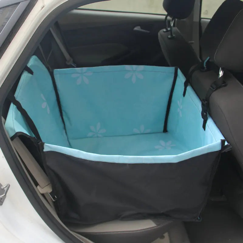 Pet car seat cover with floral pattern in a car