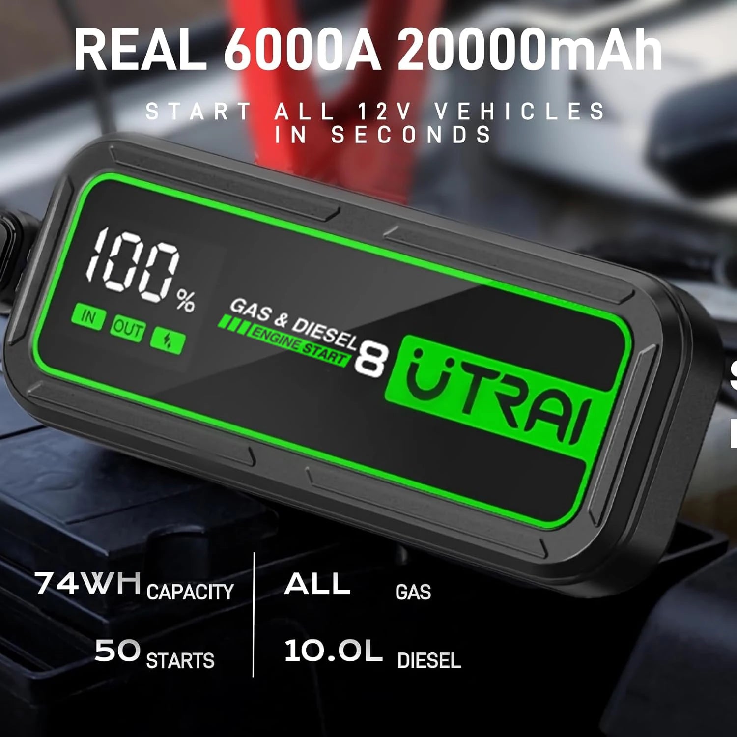 Car jump starter with digital display and branding on a blurred vehicle background