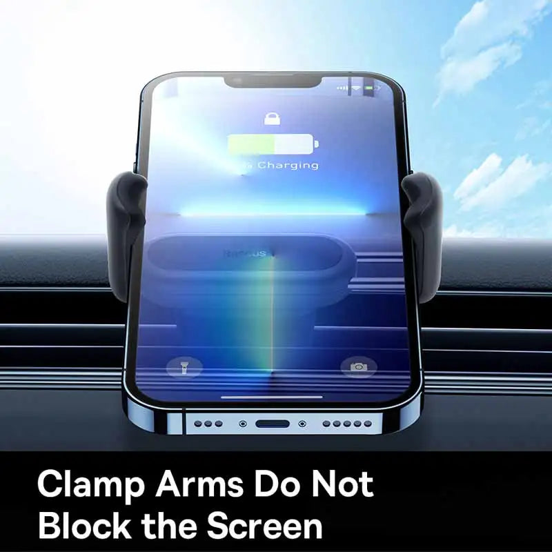 Phone holder with smartphone displaying charging screen on a car dashboard