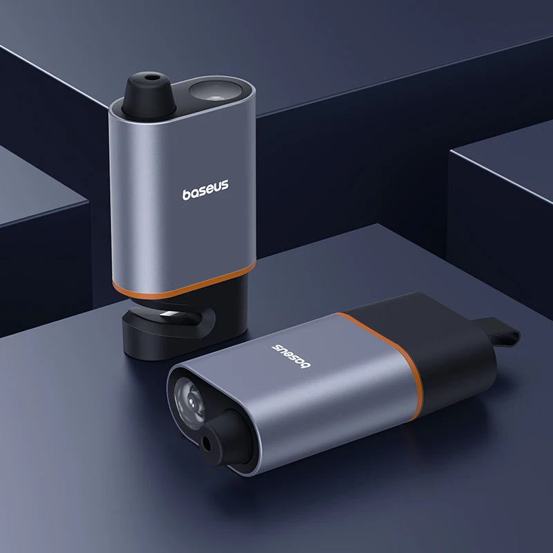 Two electronic devices with 'baseus' branding on a dark surface
