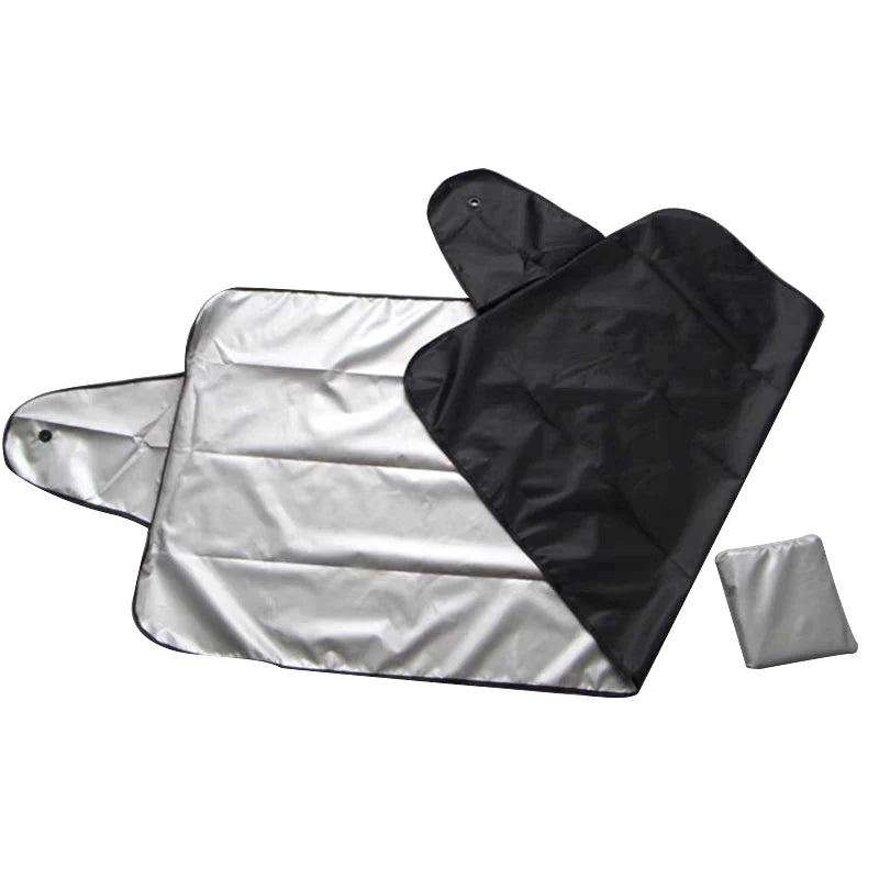 Black and silver reflective blanket on a white background