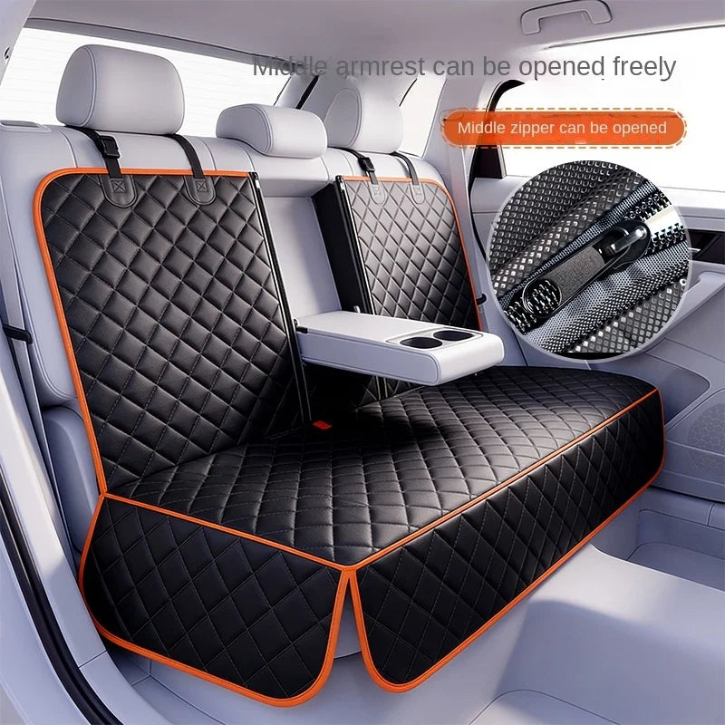 Car seat cover with quilted design and orange edges in a car interior.