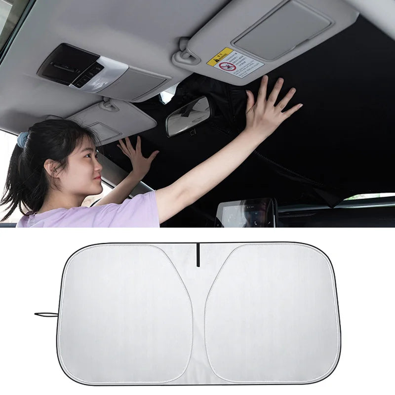 Person installing a car sunshade in a vehicle with a close-up of the sunshade below.