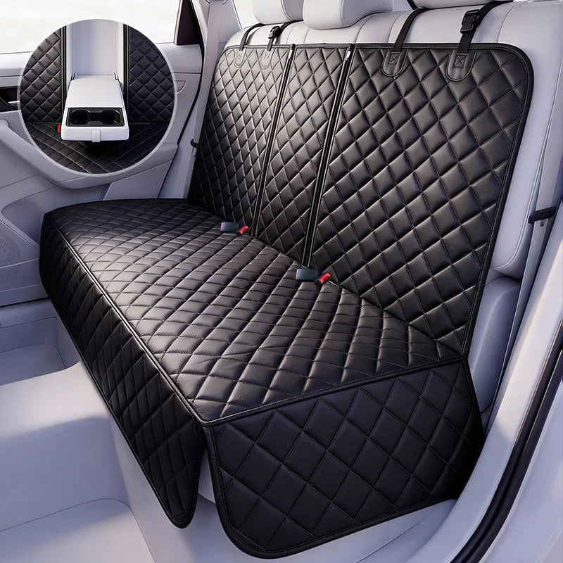 Black quilted car seat cover on a car seat with a close-up of the brand logo.