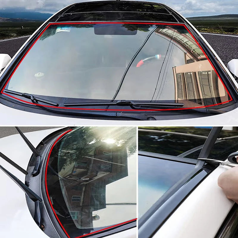 Car windshield with a red frame, wipers, and side views of the car.