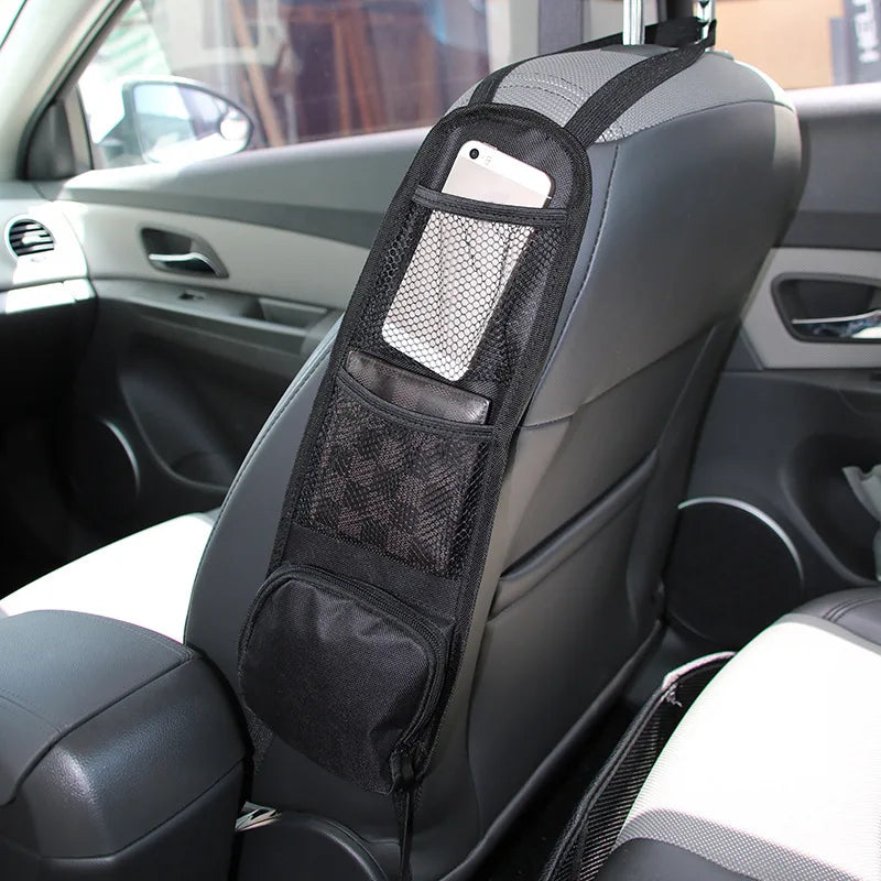Car seat organizer with mesh pockets attached to a car seat