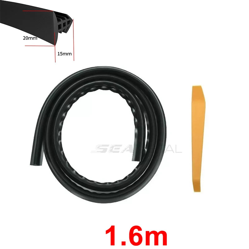 Black rubber strip with measurements and a yellow tool on a white background